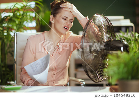 unhappy modern small business owner woman at work unhappy modern small business owner woman at work 104549210