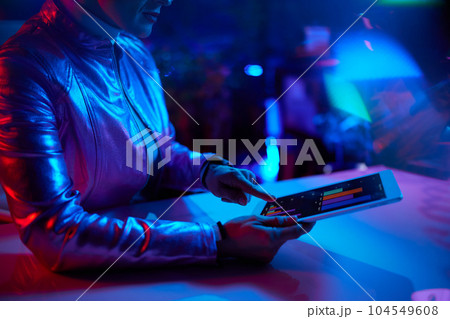 Closeup on woman using tablet PC in office 104549608