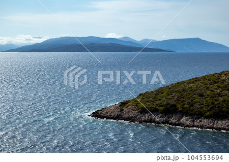 Lefkada blue sea shore cliffs with stormy waves Lefkada blue sea shore cliffs with stormy waves 104553694