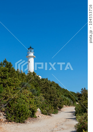 Lefkada island lighthouse on sea shore green cliff Lefkada island lighthouse on sea shore green cliff 104553716
