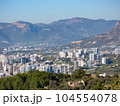 The ruins of ancient Byzantine city with new residential buildings nearby 104554078