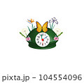 Desktop green clock in the form of a house with flowers and butterfly 104554096