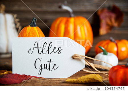Orange Pumpkin Decoration With Label With German Text Alles Gute, Which Means Best Wishes in English Orange Pumpkin Decoration With Label With German Text Alles Gute, Which Means Best Wishes in English 104554765