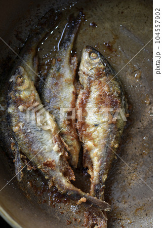 Fried river fish. Fish delicacy. Delicious fish. Fried roach. Fried river fish. Fish delicacy. Delicious fish. Fried roach. 104557902