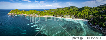 Aerial view of Haad Tien Beach and resort in Shark Bay, koh Tao, Thailand Aerial view of Haad Tien Beach and resort in Shark Bay, koh Tao, Thailand 104558618