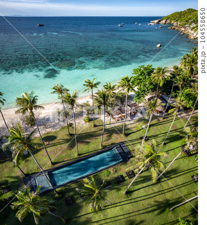 Aerial view of Haad Tien Beach and resort in Shark Bay, koh Tao, Thailand Aerial view of Haad Tien Beach and resort in Shark Bay, koh Tao, Thailand 104558650
