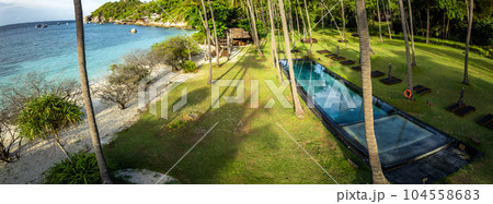 Aerial view of Haad Tien Beach and resort in Shark Bay, koh Tao, Thailand Aerial view of Haad Tien Beach and resort in Shark Bay, koh Tao, Thailand 104558683