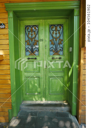 a green color wood old door in turkey  104561902