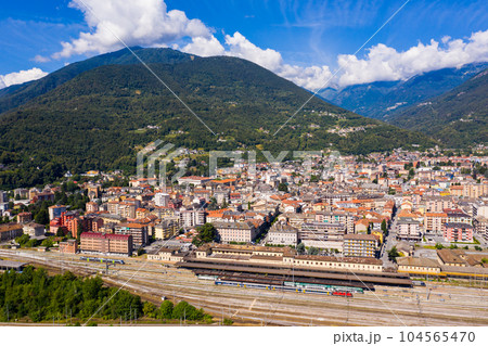Summer view from drone of Domodossola town in Alps, Italy Summer view from drone of Domodossola town in Alps, Italy 104565470