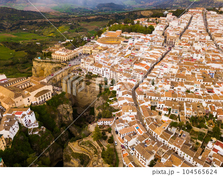 Ronda landscape and buildings with Puente Nuevo Bridge, Andalusia, Spain Ronda landscape and buildings with Puente Nuevo Bridge, Andalusia, Spain 104565624