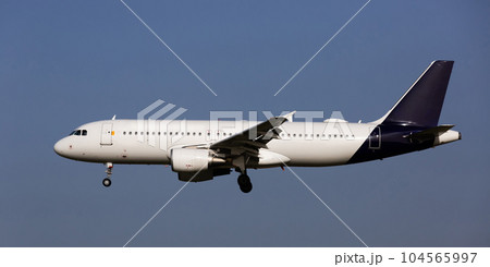 Landing passenger plane 104565997