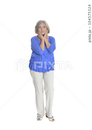 full length, serious senior woman posing, isolated on white 104575324