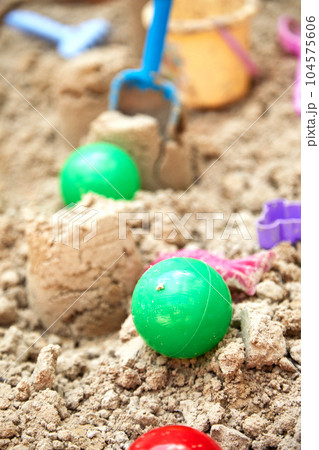 Children's sandbox with toys for the game in summer day 104575606