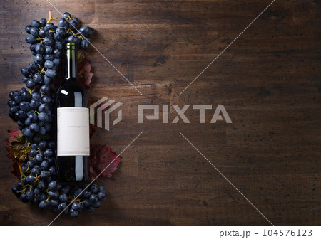 Grapes and red wine. 104576123