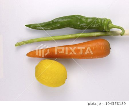 Healthy food for cooking, carrot, chili, lemon, Asparagus isolated on white background Healthy food for cooking, carrot, chili, lemon, Asparagus isolated on white background 104578189