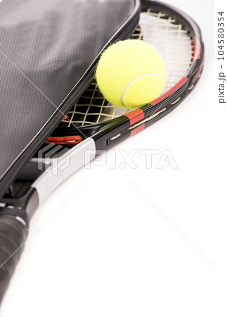 tennis racquet in a case and ball on a white background 104580354