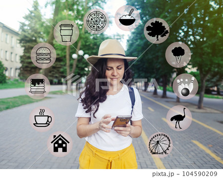 Girl thinks what to eat and where to look for entertainment. A woman is looking on her smartphone for where to go to have fun and eat in a new city. Vector icons, digitalization and augmented reality Girl thinks what to eat and where to look for entertainment. A woman is looking on her smartphone for where to go to have fun and eat in a new city. Vector icons, digitalization and augmented reality 104590209