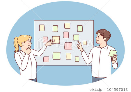 Employees engaged in creative thinking in office 104597018