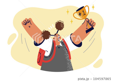 Schoolgirl with golden cup celebrates victory in school olympiad and raises hands up Schoolgirl with golden cup celebrates victory in school olympiad and raises hands up 104597865