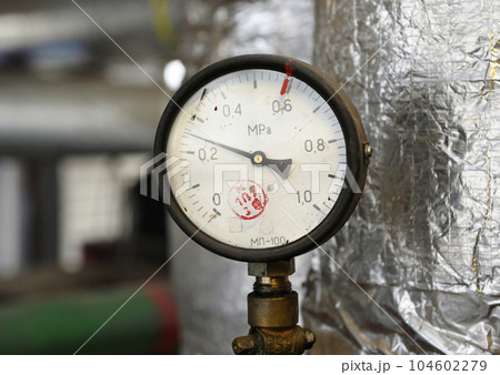 Manometer showing level of steam pressure inside of steam generation vessel 104602279