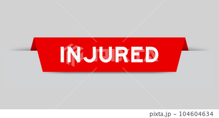 Red color inserted label with word injured on gray background 104604634