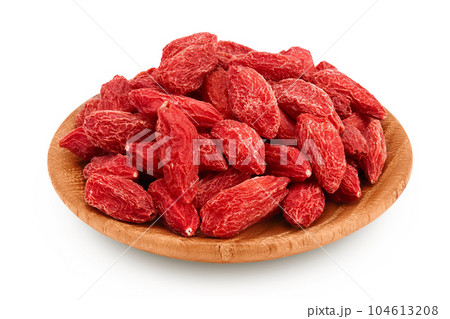 Dried goji berries in wooden bowl isolated on white background with full depth of field Dried goji berries in wooden bowl isolated on white background with full depth of field 104613208