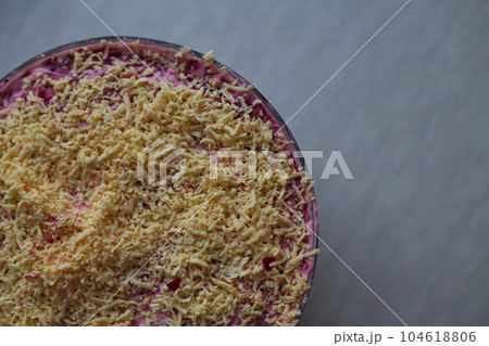 Herring under fur coat - traditional Russian layered salad with salted herring an vegetables Herring under fur coat - traditional Russian layered salad with salted herring an vegetables 104618806