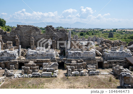 Side Ancient theatre. Turkey. Antalya. Ruins of the ancient city of Side. The largest amphitheater in Turkey. Main street of the ancient city. Mediterranean Sea. 104646473