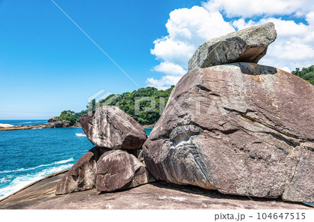 Beach Caxadaco with stones and transparent sea at island Ilha Grande, Rio de Janeiro, Brazil 104647515