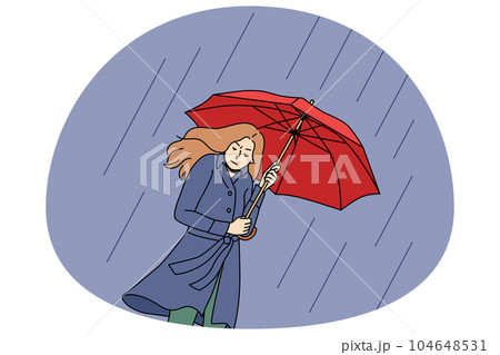 Unhappy woman going with umbrella in rain 104648531