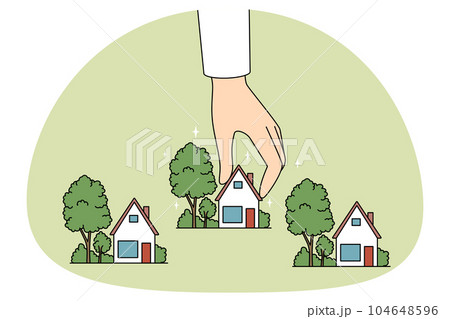 Real estate agent working with house miniatures Real estate agent working with house miniatures 104648596