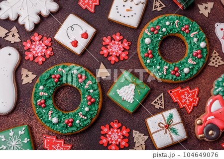 Beautiful delicious Christmas gingerbread on a concrete texture background 104649076