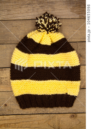 Handmade brown and yellow wool knitted winter hat Handmade brown and yellow wool knitted winter hat 104655098