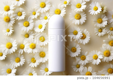 Mock-up tube of white cream in chamomile flowers 104656991