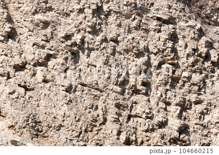 Stone texture on a rock wall. 104660215