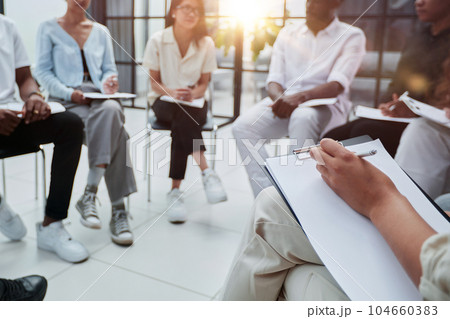 Trainees attending a business team training in a co working space office. Positive vibes and fun session. Trainees attending a business team training in a co working space office. Positive vibes and fun session. 104660383