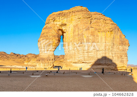 Sandstone elephant rock erosion monolith standing in the desert, Al Ula, Saudi Arabia Sandstone elephant rock erosion monolith standing in the desert, Al Ula, Saudi Arabia 104662828