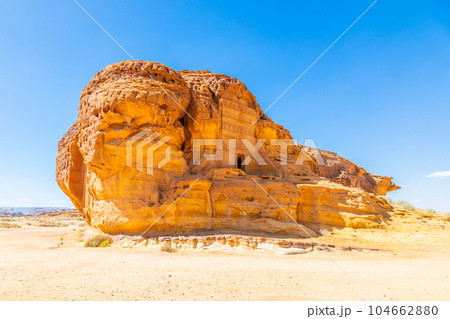Jabal al Ahmar ancient  Nabataean civilization tombs carved in stone, Hegra, Madinah Saleh, Al Ula, Saudi Arabia 104662880