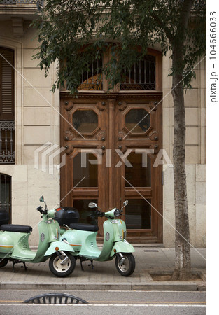 An old house in a romantic city. Colorful and beautiful gates made of wood. vintage door. 104666033