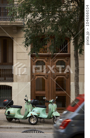 An old house in a romantic city. Colorful and beautiful gates made of wood. vintage door. 104666034