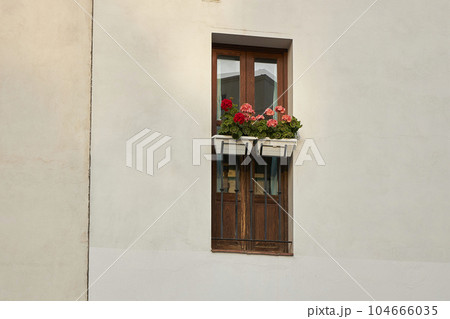 An old house in a romantic city. Colorful and beautiful gates made of wood. vintage door. 104666035
