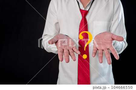 Businessman thinking and questioning with two hands with question mark. conceptual decision making. Business selection concept. The concept of finding answers in business. Businessman thinking and questioning with two hands with question mark. conceptual decision making. Business selection concept. The concept of finding answers in business. 104666550