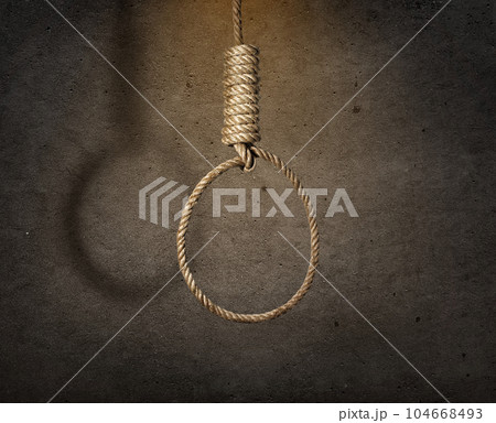 suicide concept. noose with shadow on dark wall background suicide concept. noose with shadow on dark wall background 104668493