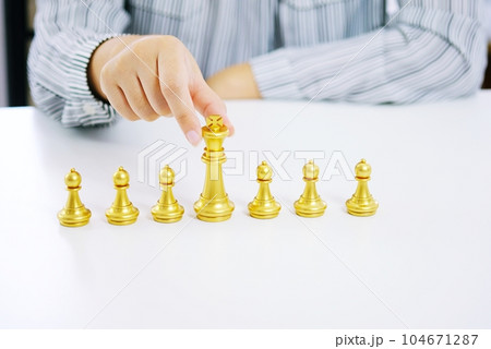 Human resources concept career management with clasped hands planning strategy with chess figures. 104671287
