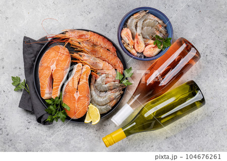 Seafood and Wine on a Table Seafood and Wine on a Table 104676261