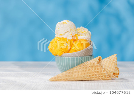 Refreshing ice cream and waffle cones with lemon flavour 104677615
