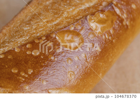 French long bread made of wheat flour, fresh baguette French long bread made of wheat flour, fresh baguette 104678370