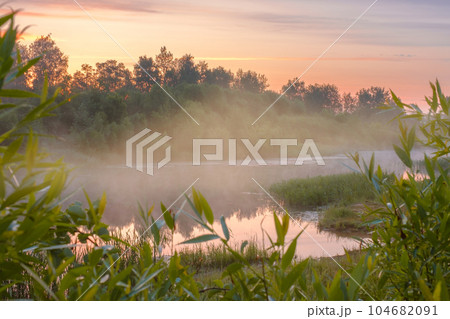 Foggy morning on the river. 104682091