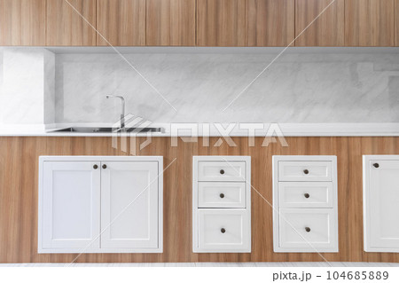 white clean kitchen counter for cooking in house 104685889