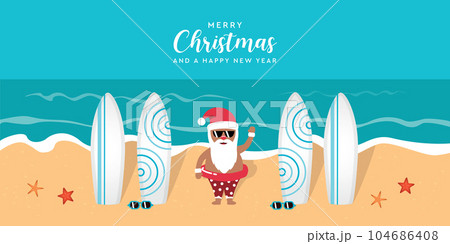 cute santa on the beach wit surfboards christmas holiday 104686408